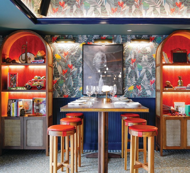 The interior of Red Rooster features a vibrant color palette that draws its guests in from the outside. PHOTO COURTESY OF RED ROOSTER OVERTOWN