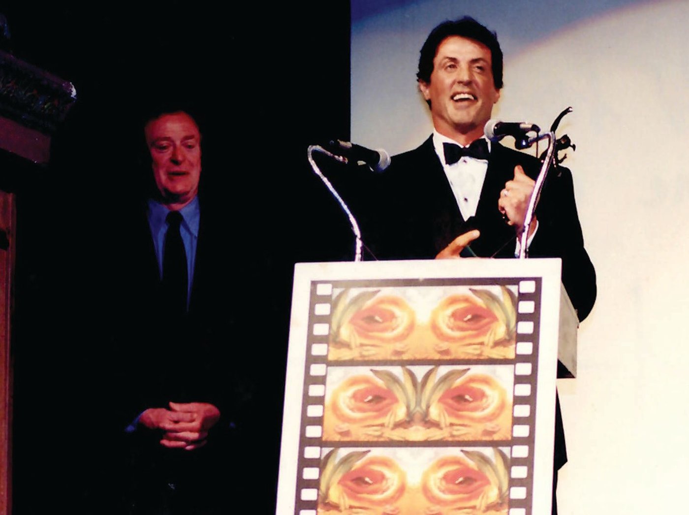 Sylvester Stallone receives a Lifetime Achievement Award from Michael Caine at Miami Film Festival