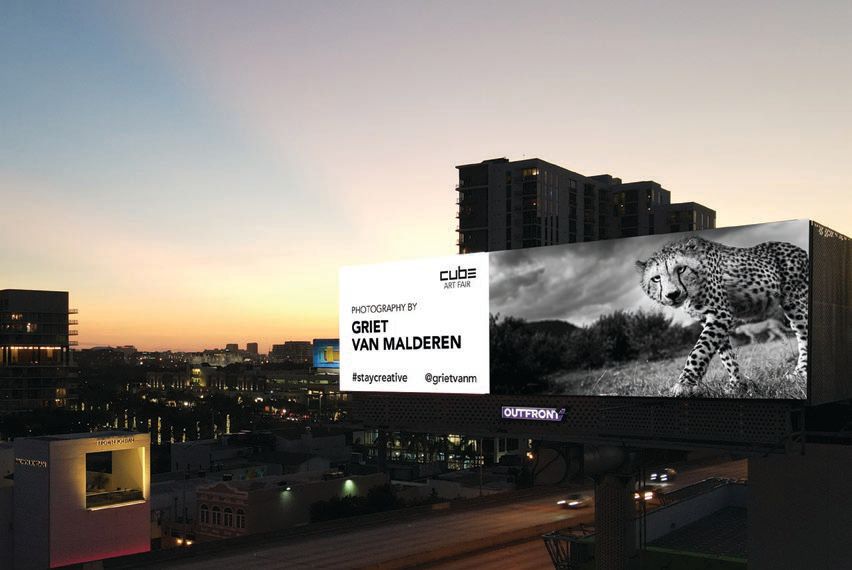 A billboard featuring photography by Griet van Malderen presented over Miami streets at dusk PHOTO BY ERIK GALINDO AND FERNANDO GALLIGANI