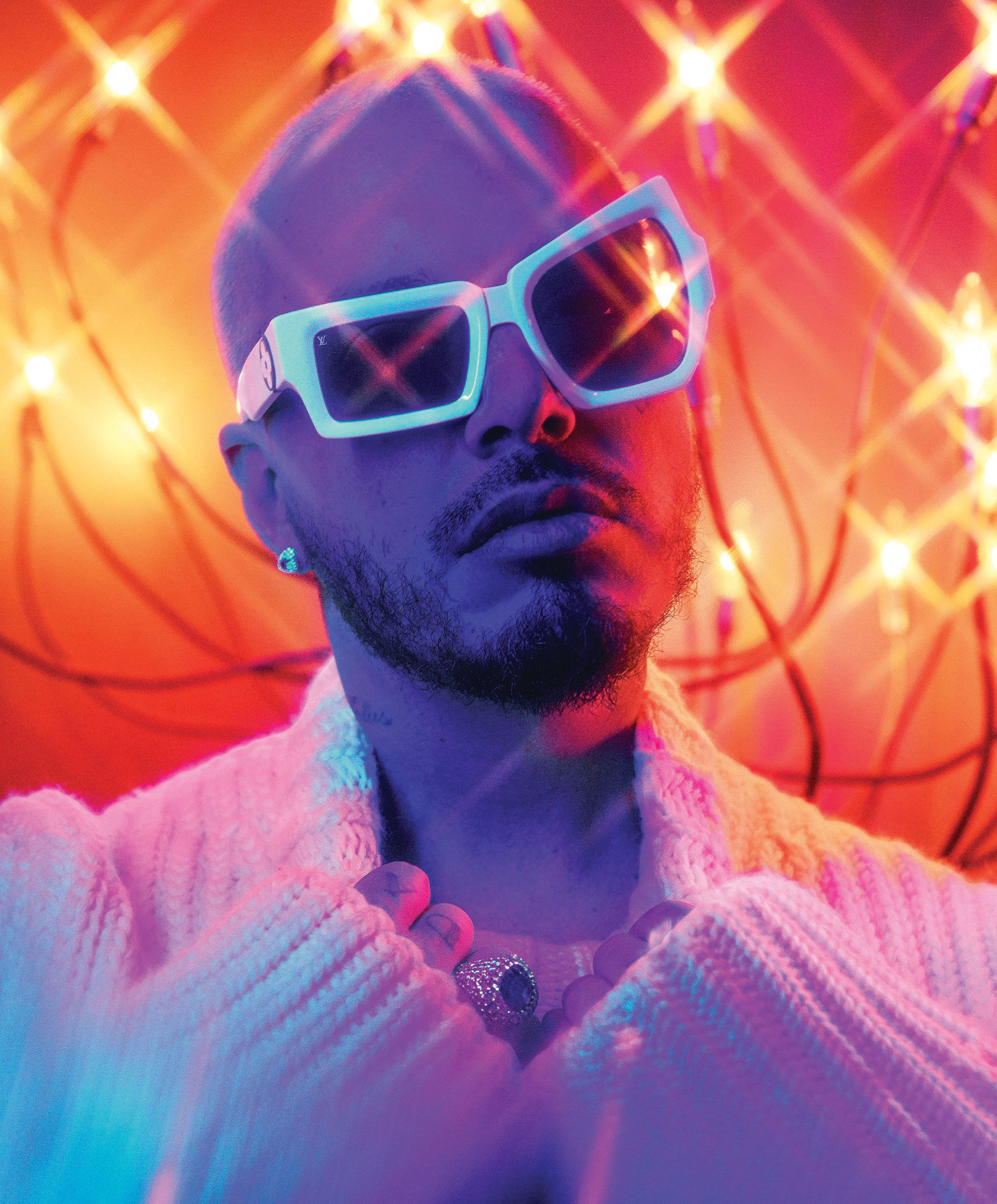 Marc Jacobs sweater, marcjacobs.com; Balvin’s own ring, sunglasses and earring PHOTOGRAPHED BY PARI DUKOVIC