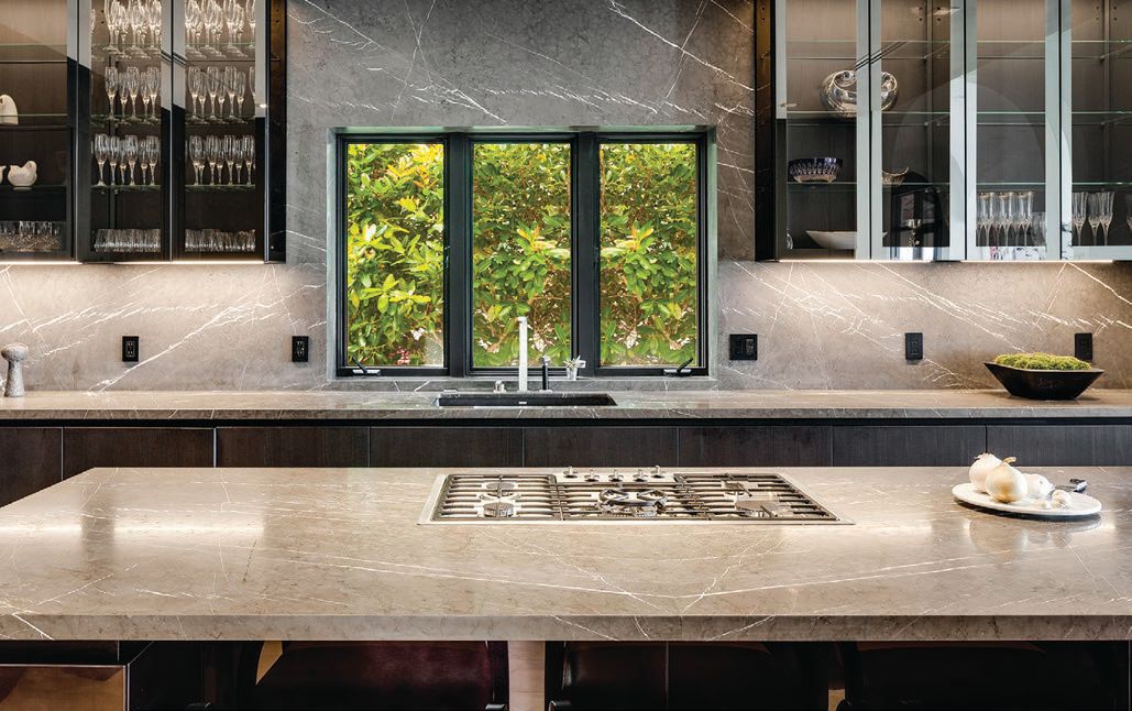 Glass and metal accents within a kitchen, all designed by ITALKRAFT. PHOTO COURTESY OF ITALKRAFT