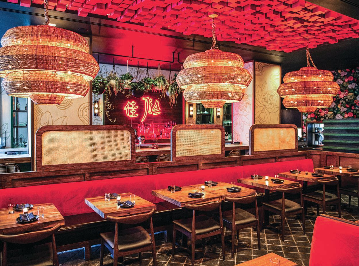 Signature bamboo chandeliers complement Jia’s main dining area PHOTO BY SETH BROWARNIK/WORLDREDEYE.COM
