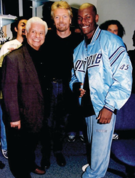 Tito Puente, Richard Branson and Tyrese Gibson at the opening of Virgin Music;