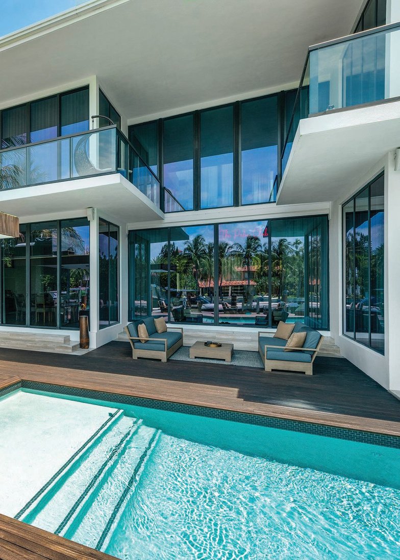 Outdoor deck and pool of 3300 Chase Ave. PHOTO COURTESY OF DOUGLAS ELLIMAN